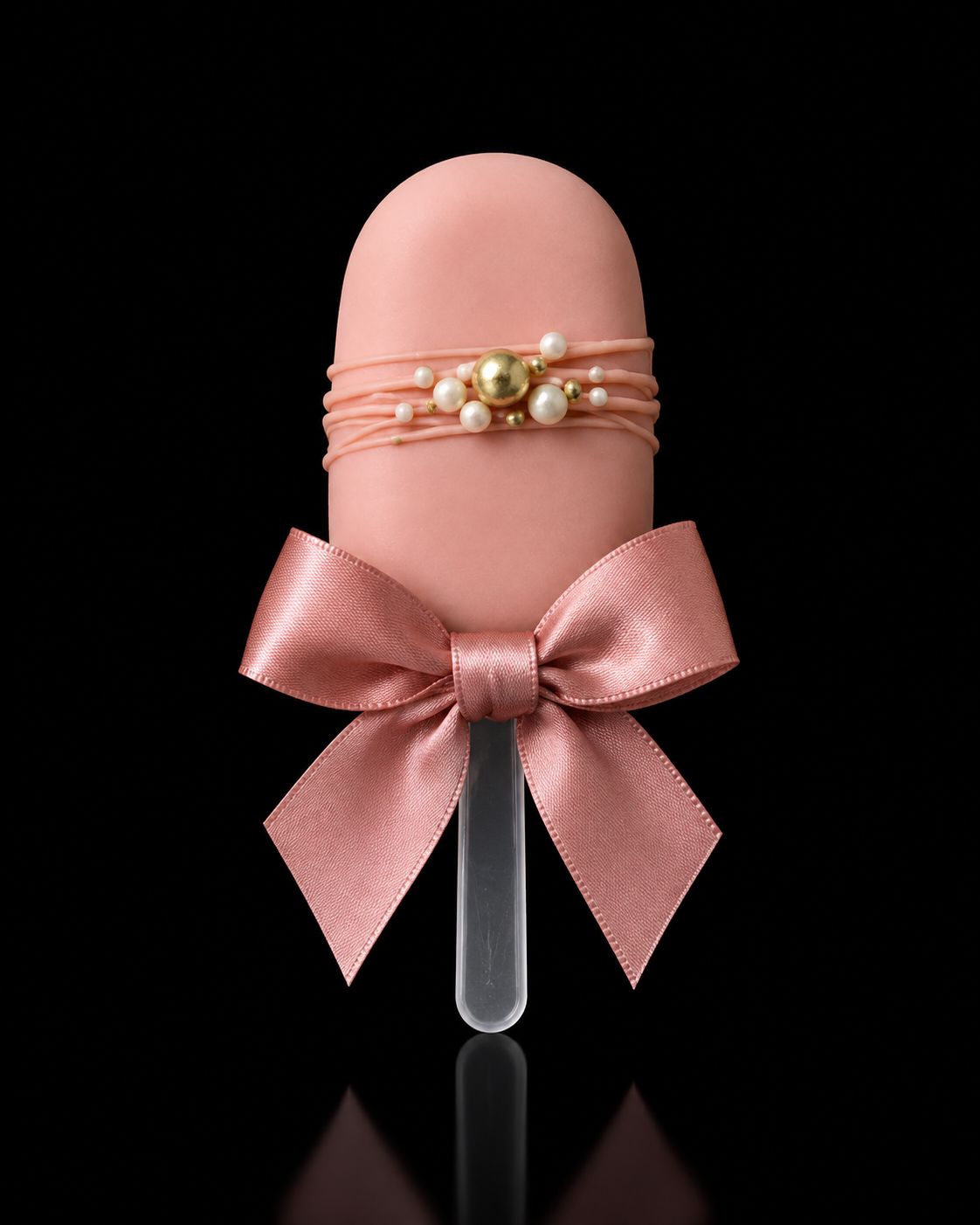 Rosé cakesicle met parels en roze strik